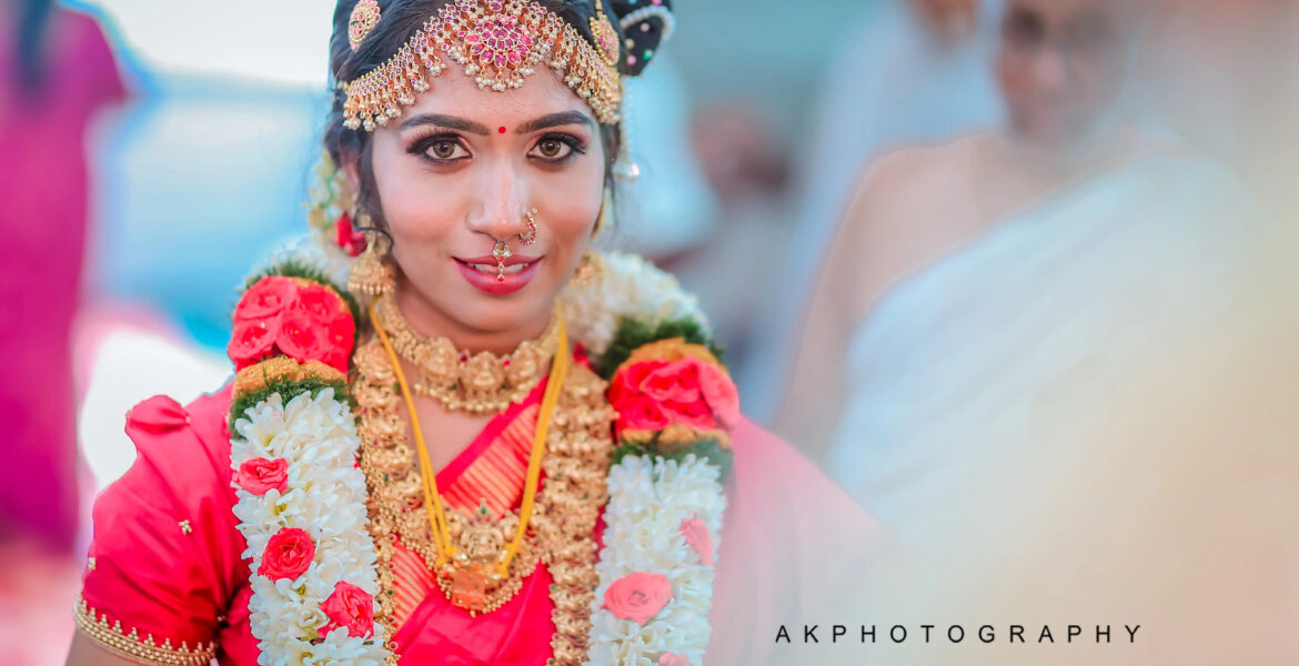 A stunning Indian bride in traditional attire during Kapila & Kokila's Brahmin Wedding Photoshoot.