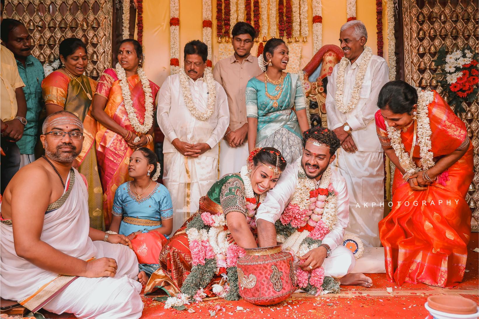 A traditional Indian wedding muhurtham with the bride and groom in beautiful attire.